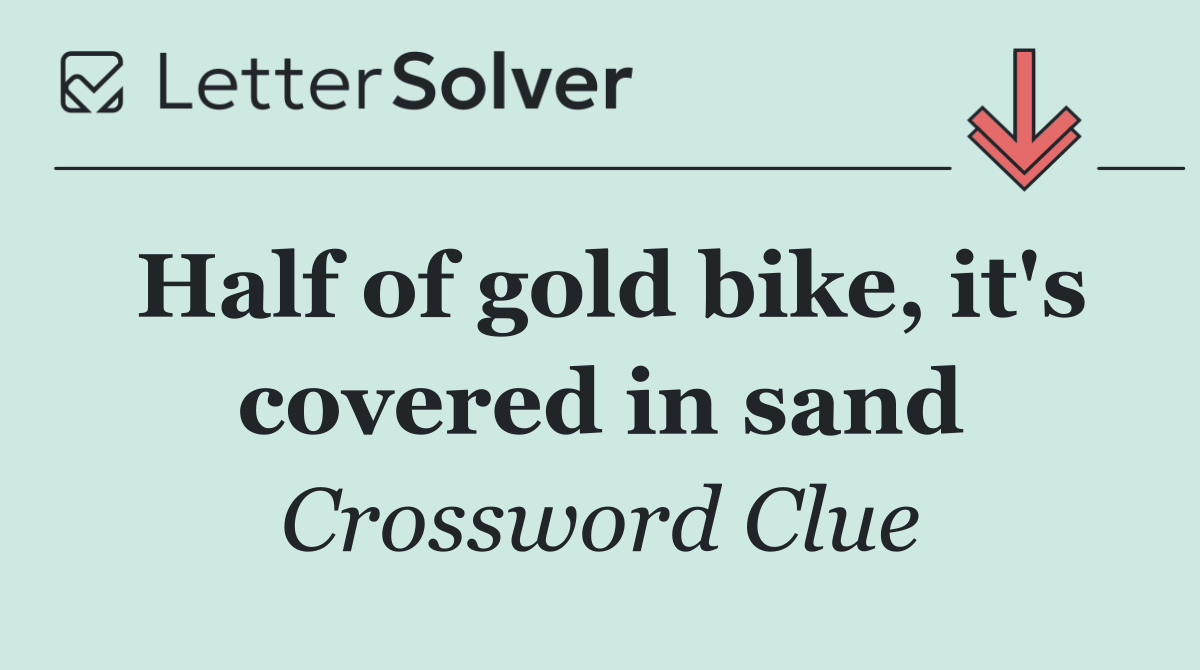 Half of gold bike, it's covered in sand