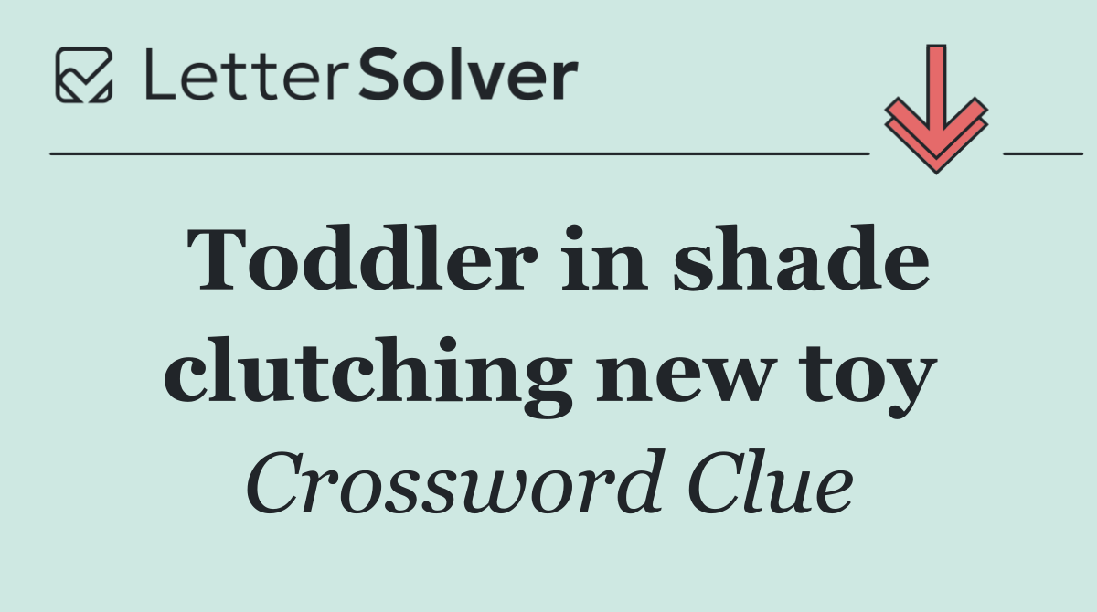 Toddler in shade clutching new toy
