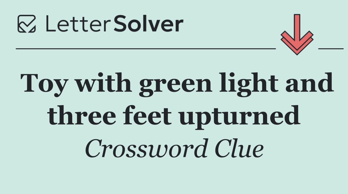 Toy with green light and three feet upturned