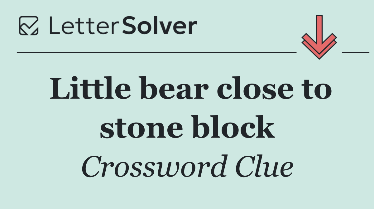 Little bear close to stone block