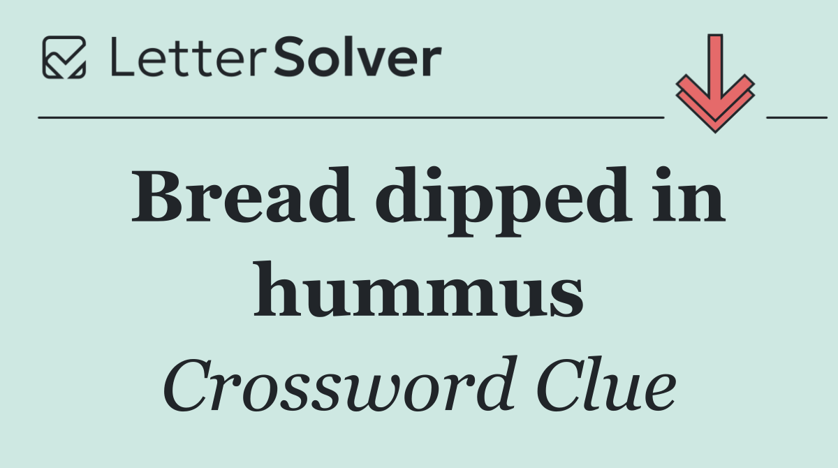 Bread dipped in hummus