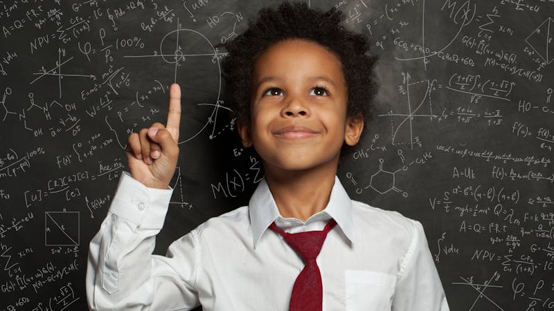 kid pointing upwards with his finger because he knows the scientific word